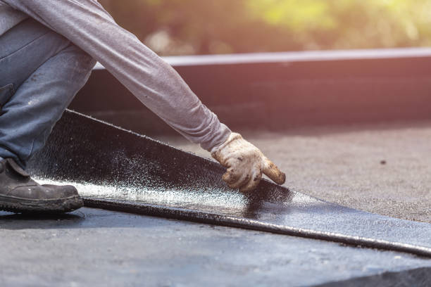 Professional Waterproofing technician working in Fremont, OH